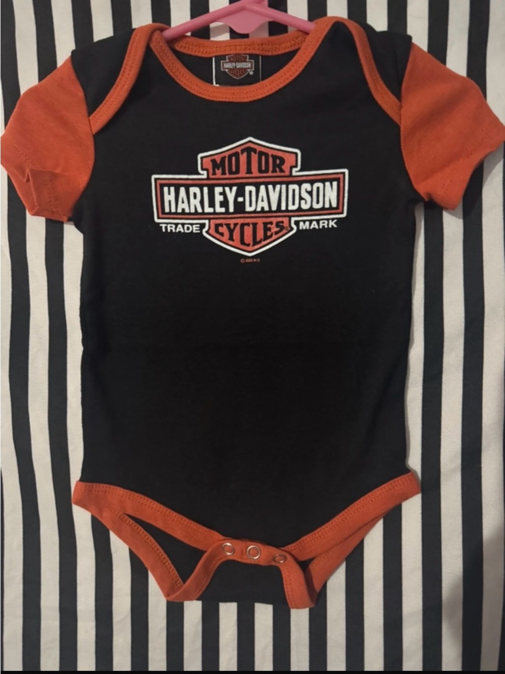 Harley‑Davidson Black and Orange Baby Bodysuit with Logo